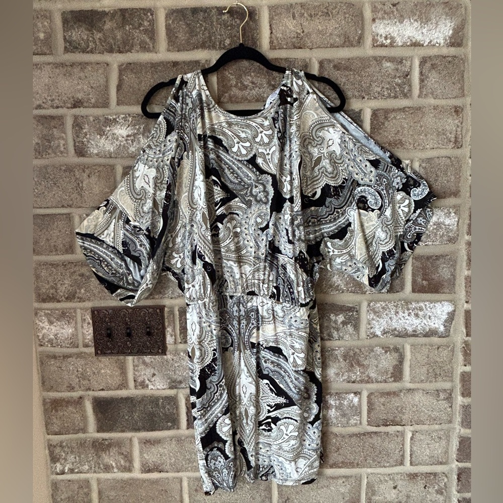 Paisley dress never worn.  Too big unfortunately.   Cold shoulder and so cute